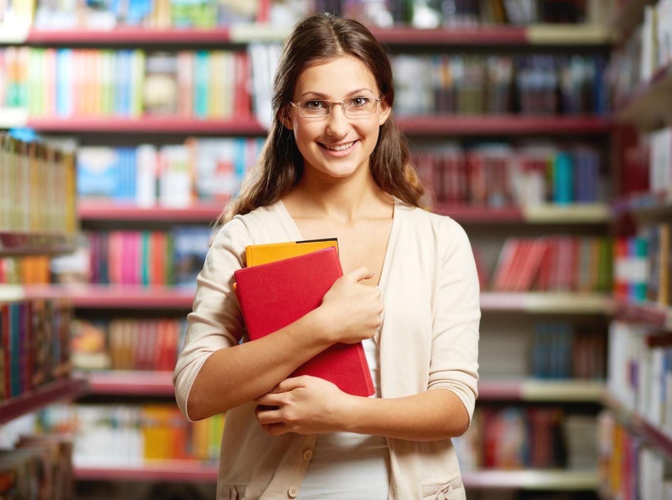 Person reviewing financial documents and planning budget